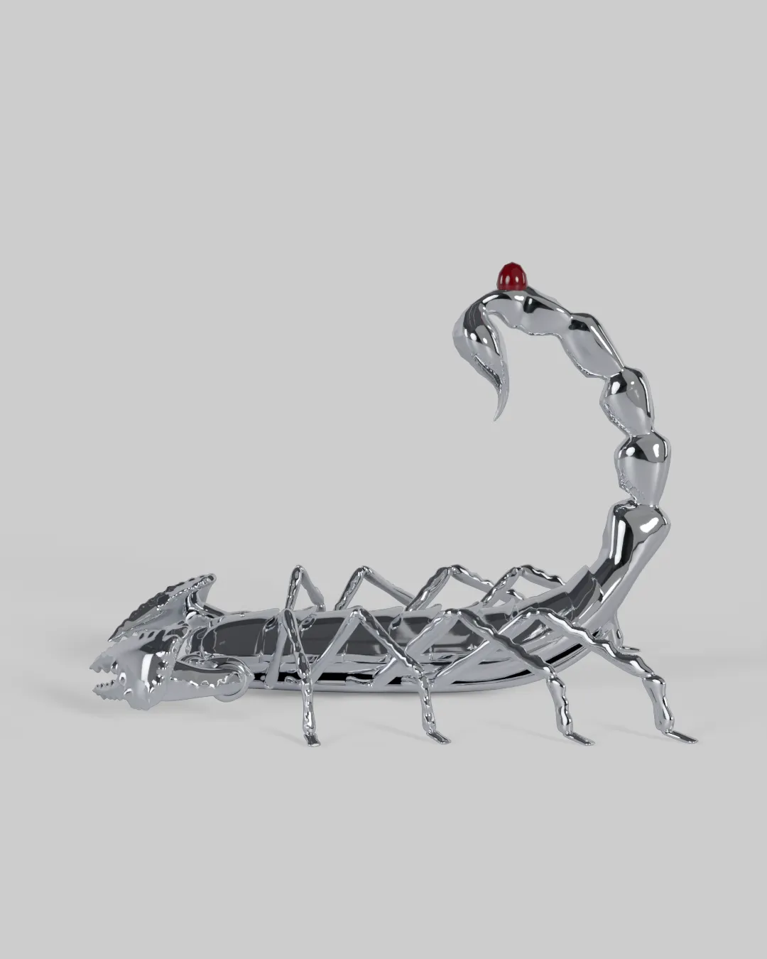 A chrome scorpion with claws forward and a blood-red venom drop at the stinger.