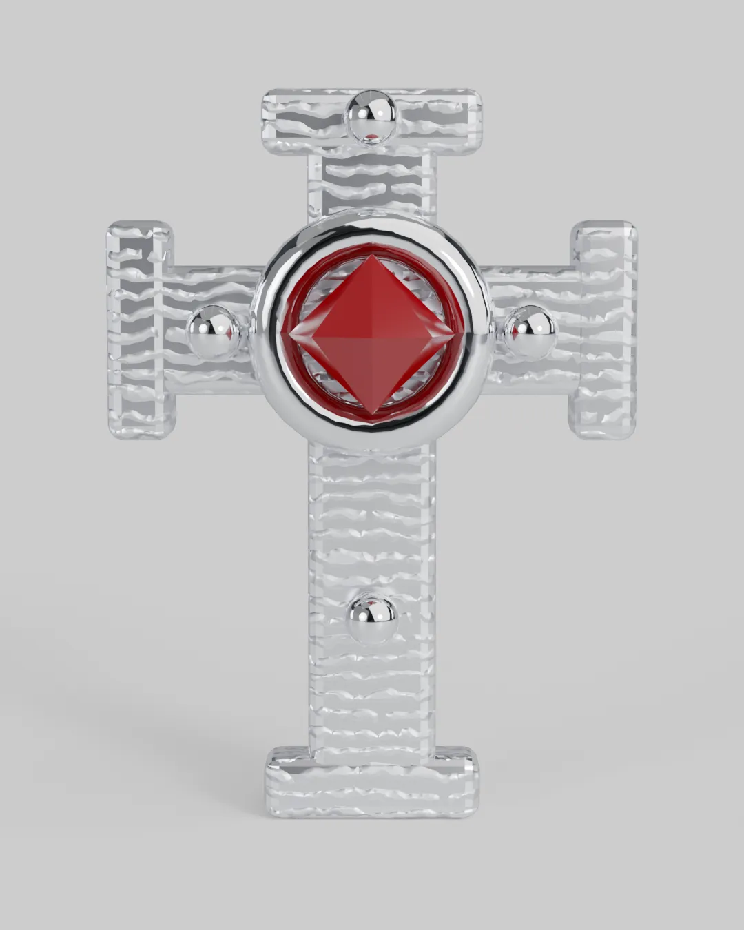 An intricately engraved chrome cross with a bezel-set ruby at the crossing.