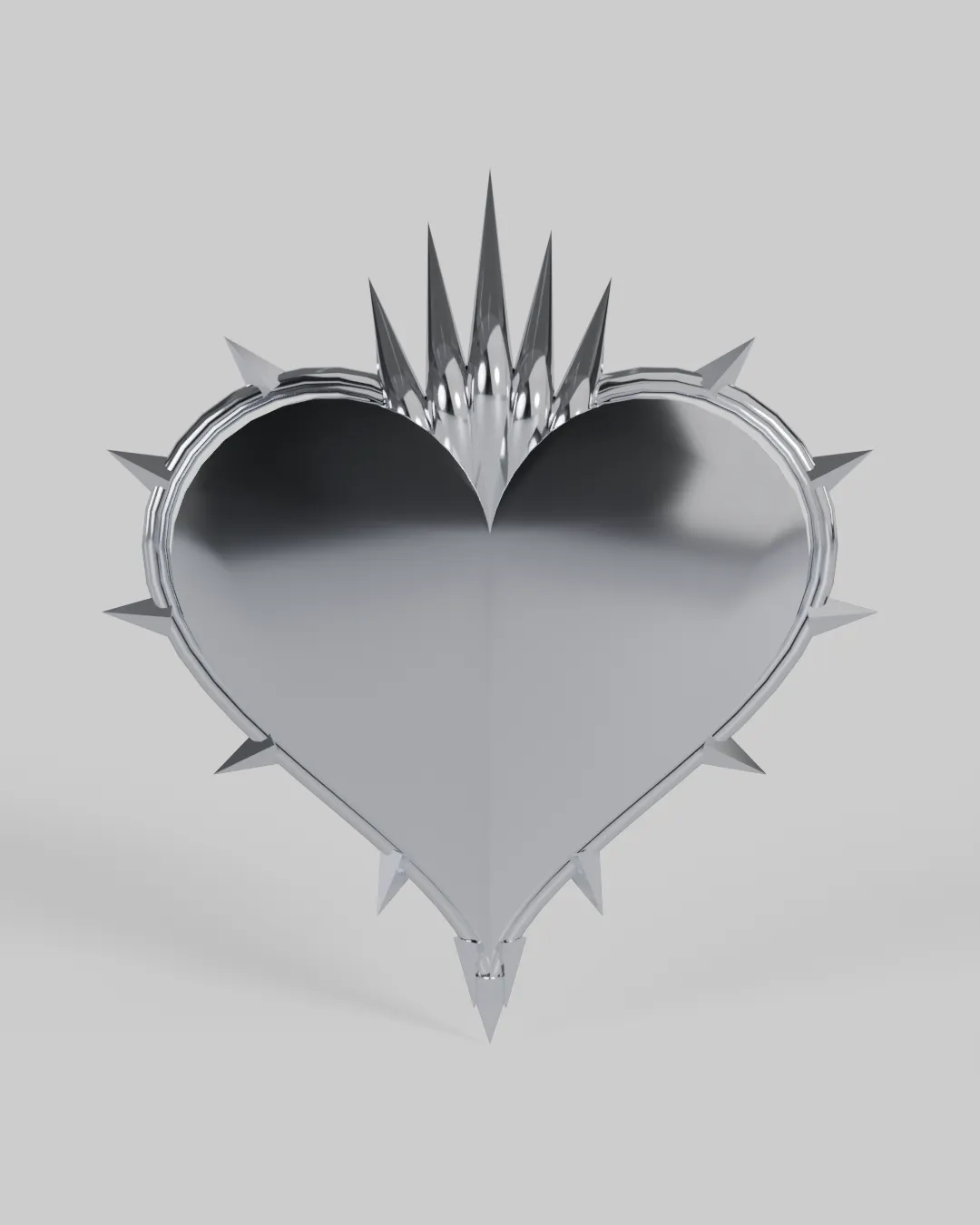 A thorned, flaming chrome heart in chrome and dark metal.
