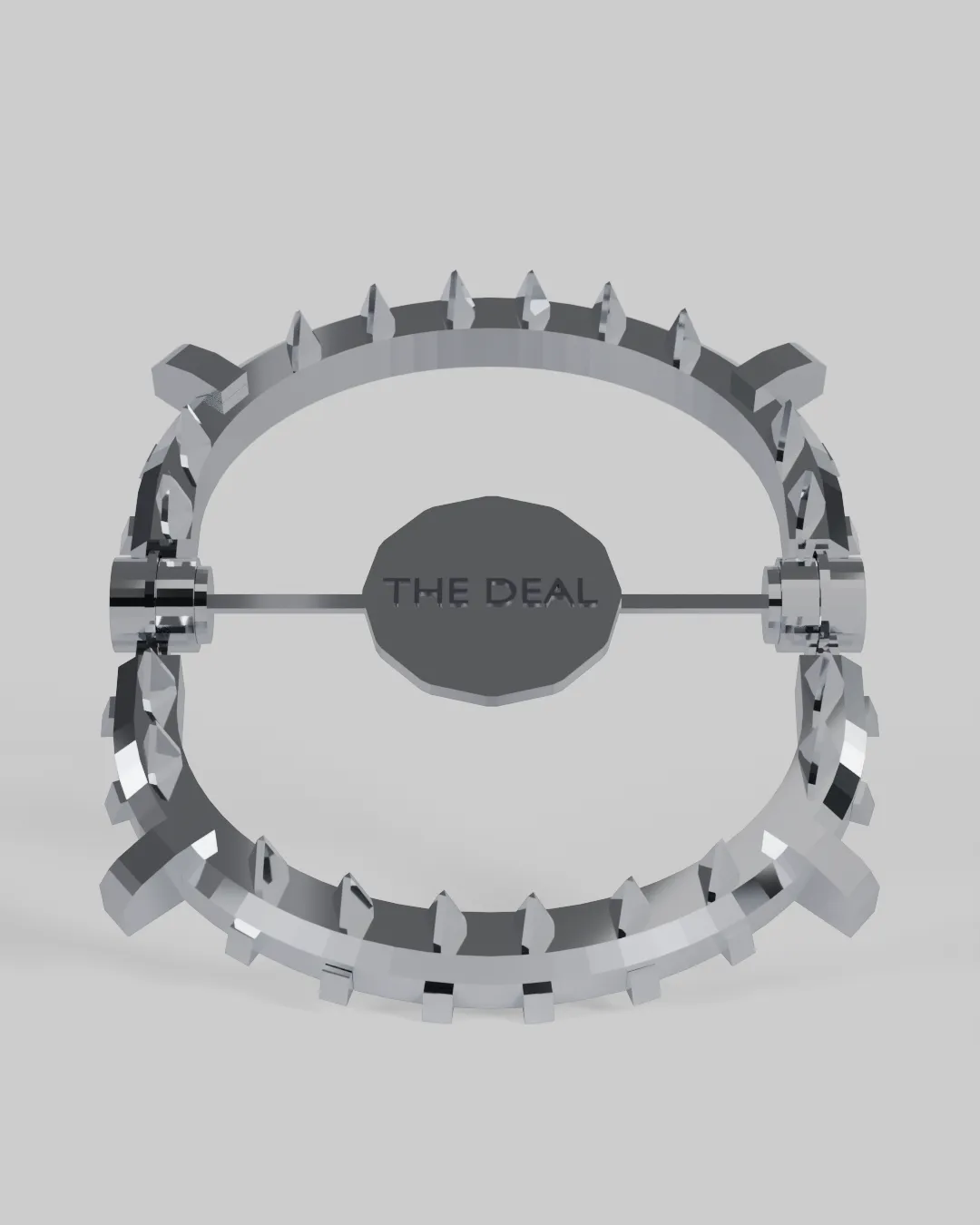 A chrome bear-trap sculpture, toothed ring open, engraved THE DEAL.